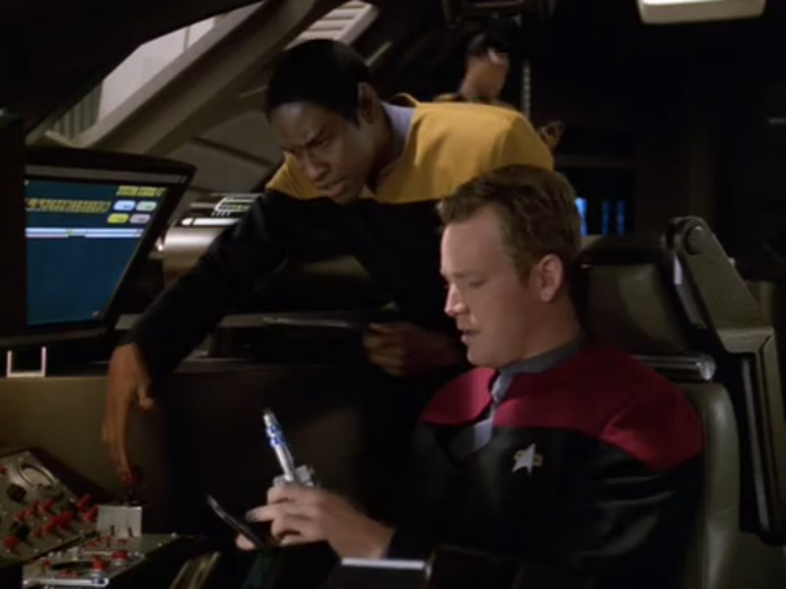 Star Trek Voyager Tuvok pointing at shuttle knobs